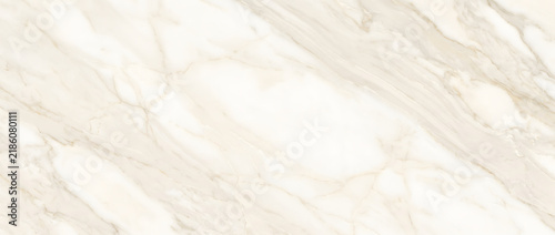 Elegant marble texture background with flowing golden veins on creamy white stone surface perfect for luxury interior design projects