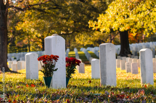 Arlington National Cemetery - Headstones and flowers in autumn - Circa Washington D.C. United States of America