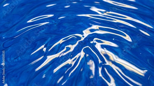 Glossy Blue Liquid Surface with Swirling Light Reflections