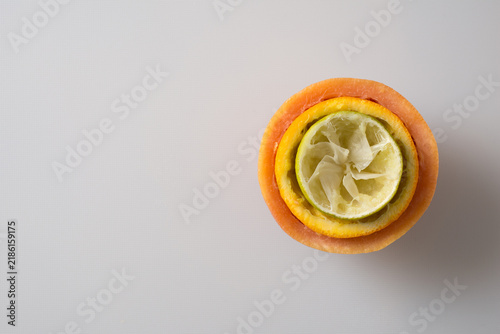 Fruit peelings on white board top view