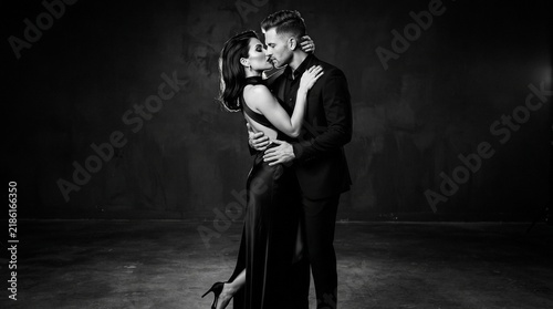 Elegant Couple in Formal Evening Attire - Romantic Luxury Interior with Fireplace - Opulent Mansion Gala Party Scene
