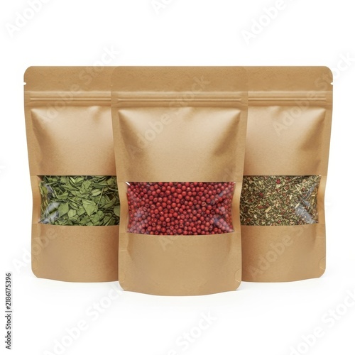 Three pouches of dried herbs and spices in packaging