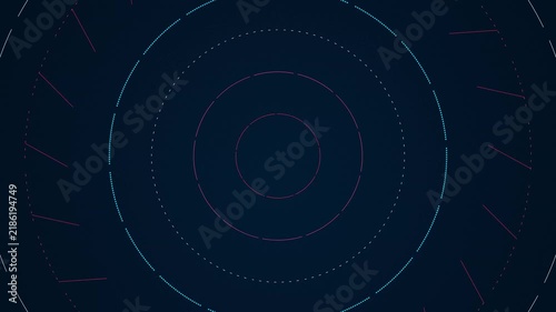 Rotating concentric rings with glowing neon light particles moving across a dark science fiction space environment