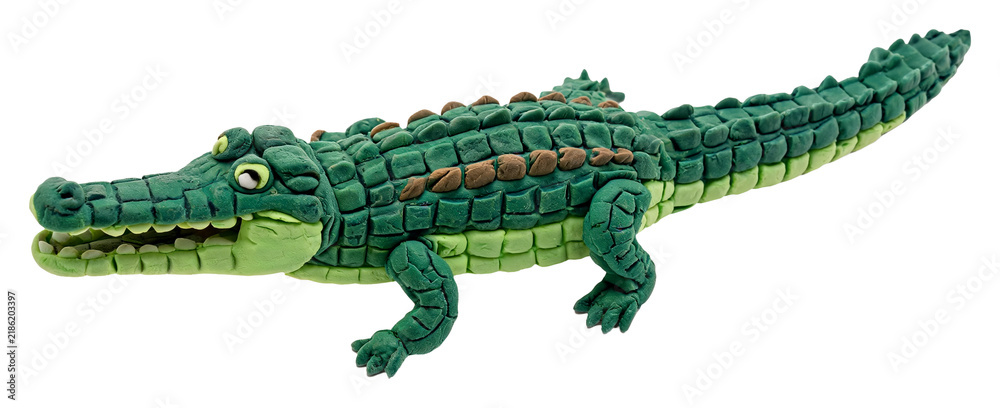 Fototapeta premium Playful green clay crocodile figure with detailed scales and open mouth