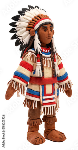 Claymation figure of a Native American chief wearing a feathered headdress and traditional attire