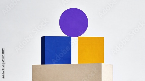 Geometric shapes are balanced in a minimalist composition.