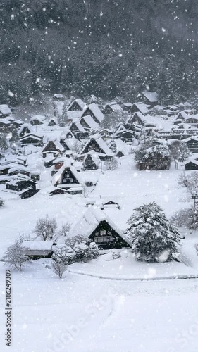 Snowfall in Shirakawago village in winter, UNESCO world heritage sites, Japan. Vertical.