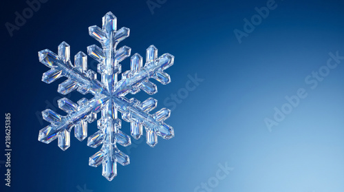 Crystalline snowflake hovering against blue gradient background, displaying intricate symmetry and delicate winter beauty in serene composition