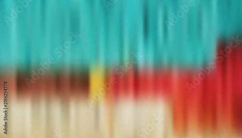 Foto Grain textured background with colorful abstract gradients in teal brown and red