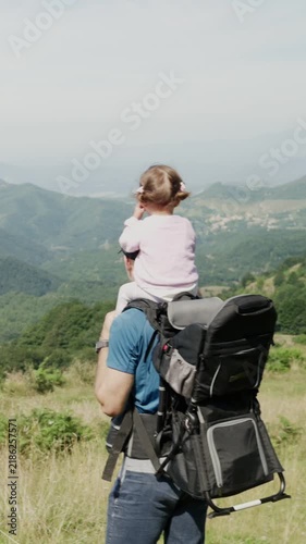 Young multiethnic family enjoying a mountain hike together