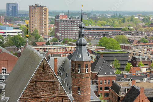 A scenic overlook of the historic city center of Groningen, Netherlands, specifically highlighting the ornate tower of the Provinciehuis (Groningen Provincial Hall).