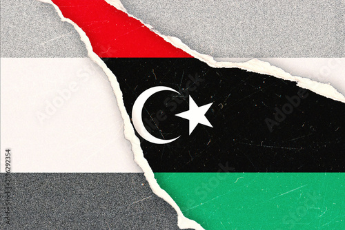 Принти на полотні Libyan National Flag Design with a Dramatic Torn Paper Effect Symbolizing Politi