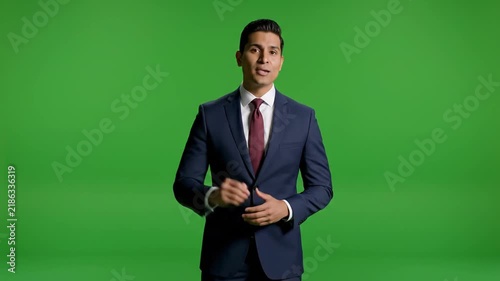 Professional News Anchor Presenting Information in a High Quality Studio Video Broadcast Environment