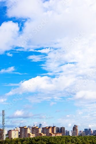 Photography blue sky with large white cloud over city district