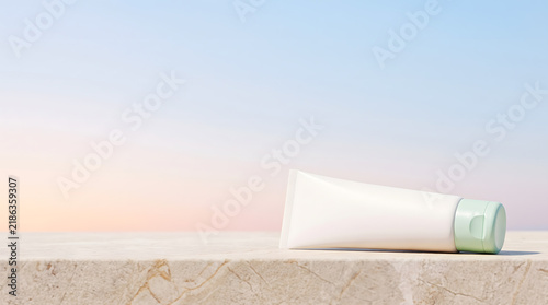 White Cosmetic Tube with Sage Green Cap Lying on Marble Ledge Against Soft Pastel Sunset Sky