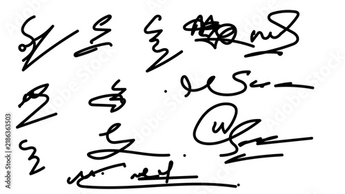 Foto Signatures written in black ink are displayed across the white paper surface, showing various handwritten styles