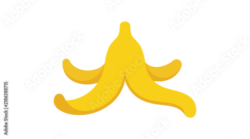 Yellow banana peel lies discarded on a white background