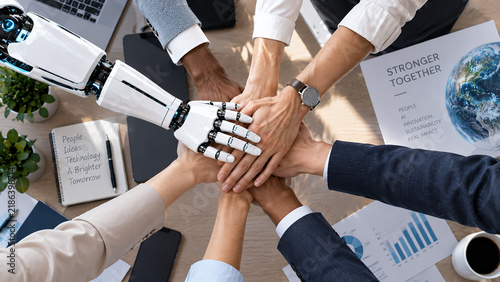 AI and human collaboration with robot arm stacking hands with diverse business team for unity and innovation