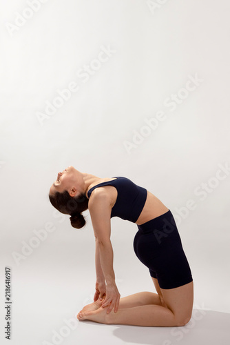 Woman Performing Camel Pose Yoga Exercise