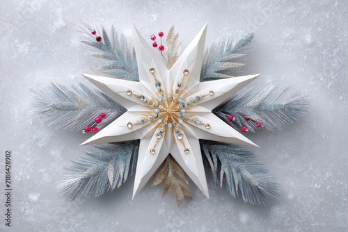 Paper snowflake ornament decorated with jewels and glitter feathers