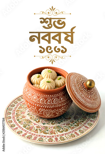 Traditional Bengali sweet dish served in a decorative clay bowl for cultural celebration