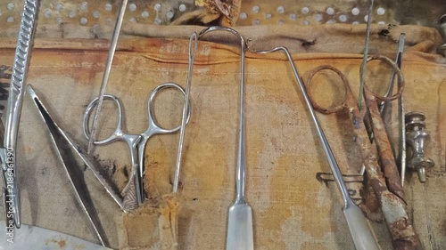 Antique dentist tools on display from a different time period
