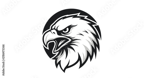 Fierce bald eagle head mascot logo inside a circular black and white frame representing strength and freedom.