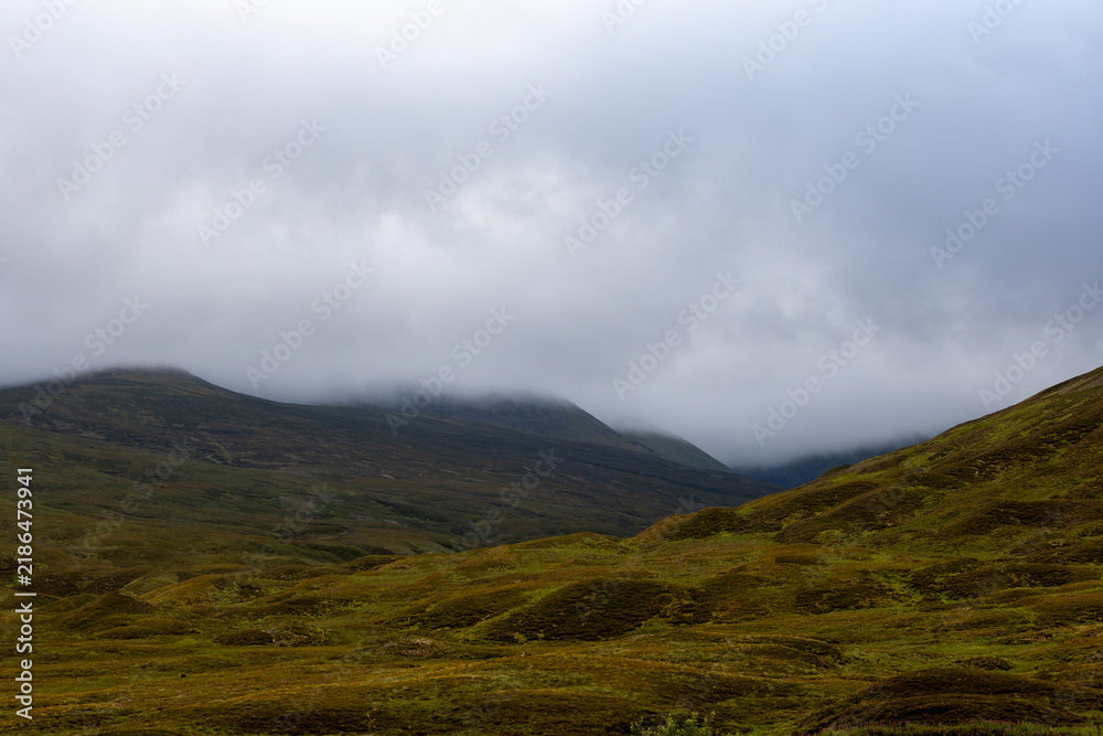 Obraz premium Misty Highland Landscape in Scotland, UK.