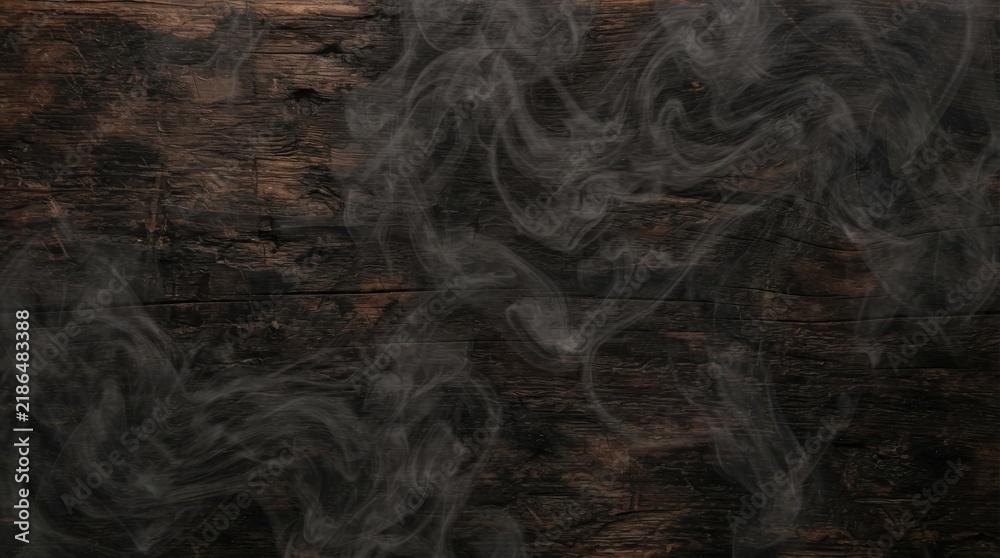Obraz premium Smoke swirling over dark wooden background