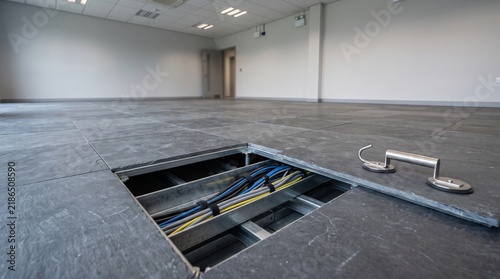 Raised floor service channel in operations suite