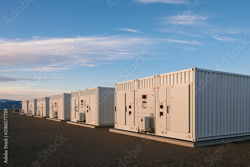 Grid scale battery energy storage facility with solar power