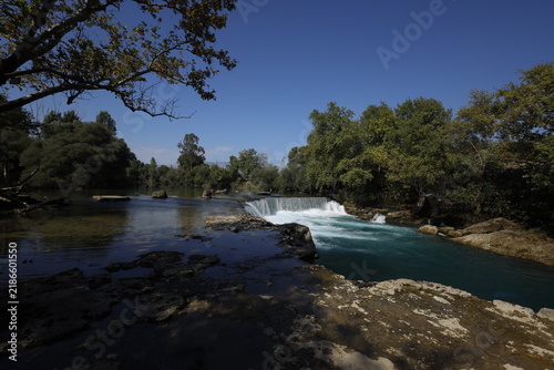 Scenic view of Manavgat Waterfall flowing into the river in Antalya, Turkey