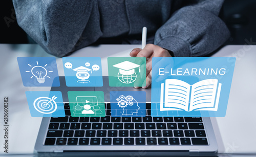Naklejka Person using laptop with e-learning and education icon. online learning concept, digital education, virtual classroom, AI tutor, knowledge sharing, training study course, remote academic development