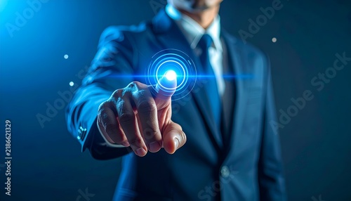 Businessman interacting with a luminous digital interface, symbolizing technology adoption, innovation, connectivity, interactive systems, and futuristic business communication.