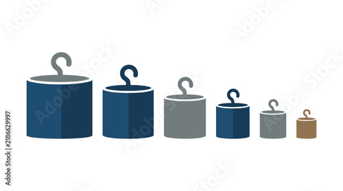 Set of isolated calibration weights in decreasing size, dark blue and grey