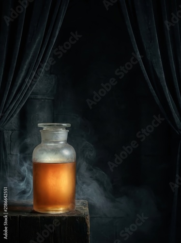 Mysterious old glass bottle filled with amber liquid, emitting wisps of smoke, set against a dark, dramatic backdrop with velvet