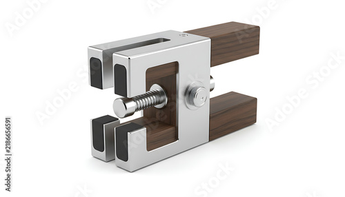 A silver metal edge banding clamp with dark wood handles and rubber pads sits on a white.
