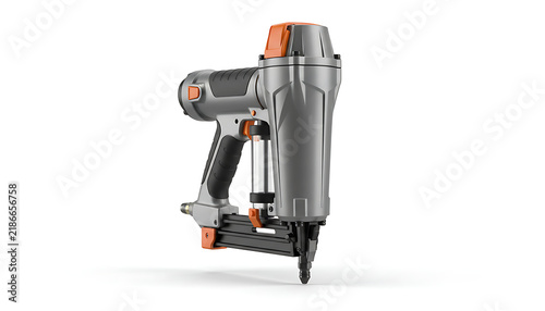 A professional pneumatic finish nailer tool with orange accents is isolated on a white.