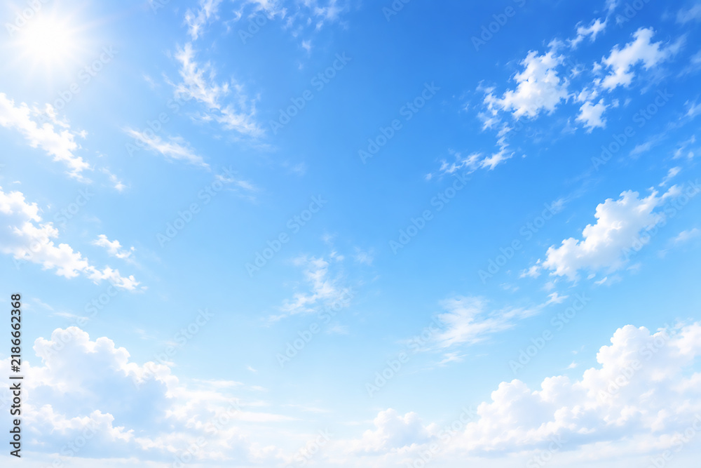 Obraz premium Blue clear sky, clouds, sunshine, blue weather, cotton candy background