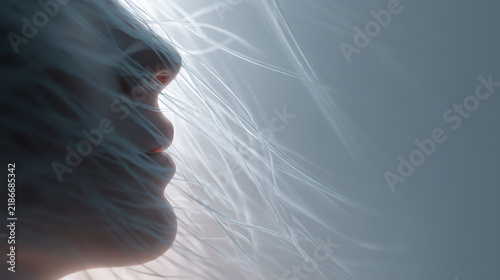 Female face profile hair wind blue closeup portrait