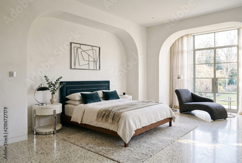 Elegant Minimalist Master Bedroom with Curved Alcove and Terrazzo Floor
