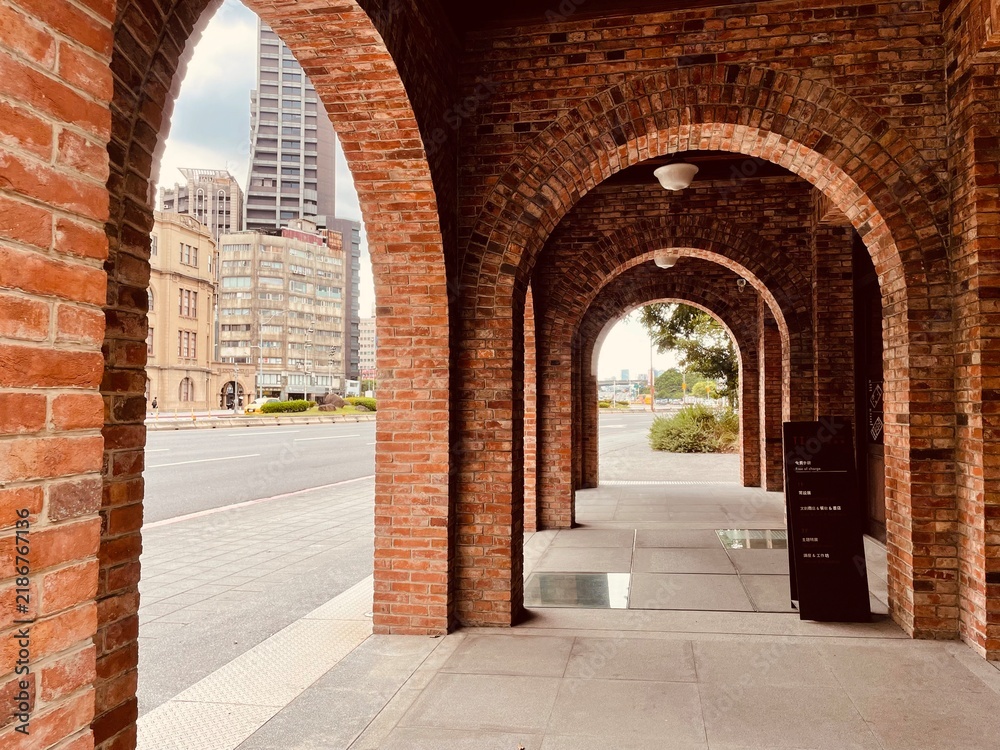 Fototapeta premium Taipei Info Hub Historic Red Brick Building – Former Mitsui & Co. Warehouse from Japanese Colonial Era in Taiwan