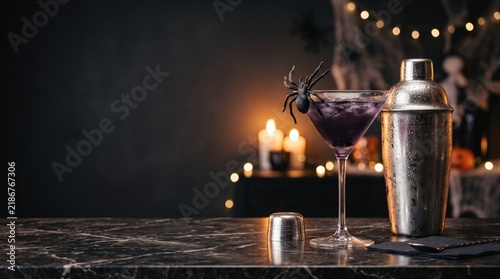 Halloween cocktail photo with spider, cocktail shaker, and moody atmospheric lighting on dark bar counter