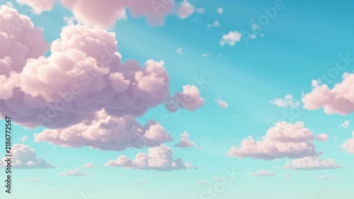 Soft pink clouds floating in a bright blue sky