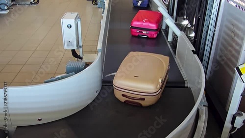 An airport luggage belt. Baggage carousel or luggage carousel.