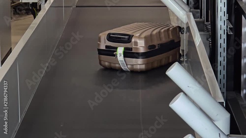 An airport luggage belt. Baggage carousel or luggage carousel.