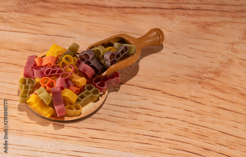 Obraz na plátně Colorful Italian pasta with obscene shapes especially for tourists