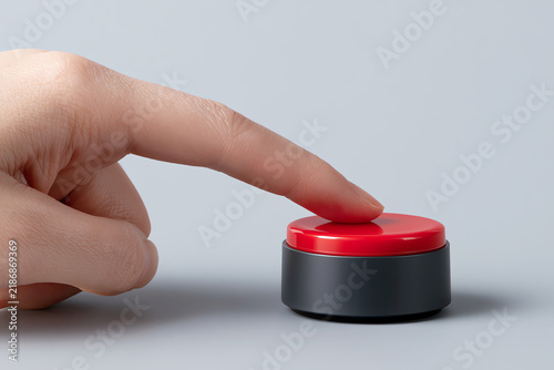 Fototapeta Finger presses a red button, AI generated
