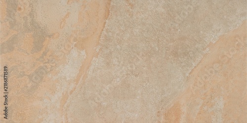Foto Weathered sandstone texture with warm orange and beige tones beige background or