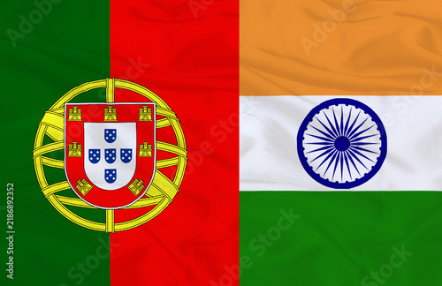 Portugal and India Flags Together Waving Fabric Texture